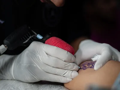 gun tattoos cultural trend