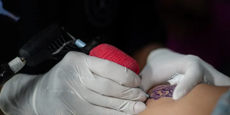 gun tattoos cultural trend