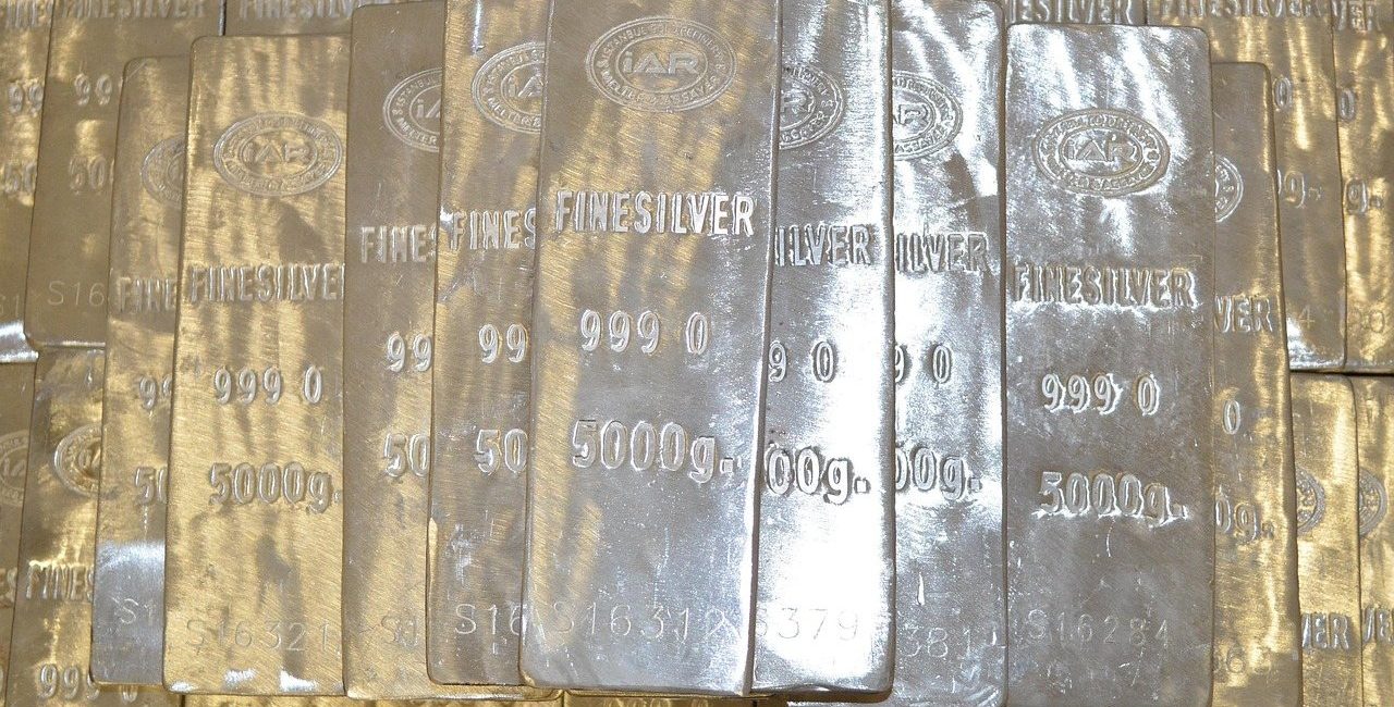 Stacked fine silver bars stamped 999.0 and 5000g