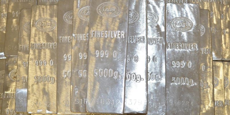 Stacked fine silver bars stamped 999.0 and 5000g