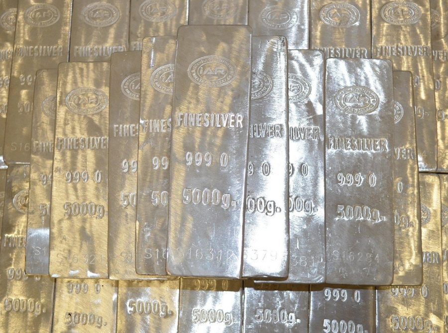 Stacked fine silver bars stamped 999.0 and 5000g