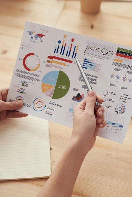Industry Fluency Separates Standout Search Agencies From the Rest of the Field: marketing specialists reviewing SEO and campaign analytics charts at a desk